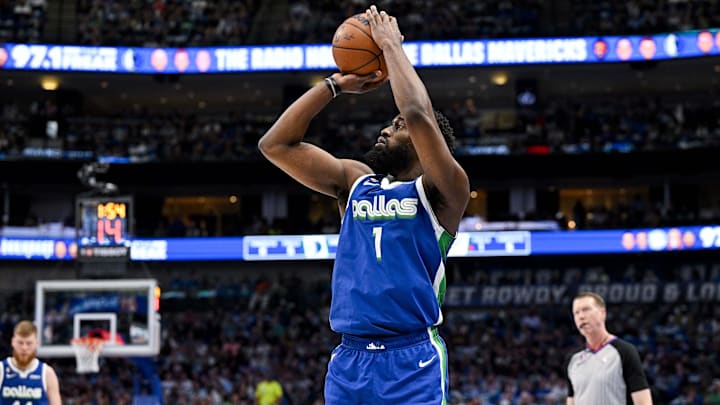 Apr 9, 2023; Dallas, Texas, USA; Dallas Mavericks guard Theo Pinson (1) makes a three point shot against the San Antonio Spurs during the second quarter at the American Airlines Center. Mandatory Credit: Jerome Miron-Imagn Images