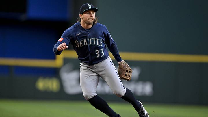 Apr 6, 2026; Arlington, Texas, USA; Seattle Mariners third baseman Brendan Donovan (33) looks for the ball during the game between the Rangers and the Mariners at Globe Life Field. Mandatory Credit: Jerome Miron-Imagn Images Apr 6, 2026; Arlington, Texas, USA; Seattle Mariners third baseman Brendan Donovan (33) looks for the ball during the game between the Rangers and the Mariners at Globe Life Field. Mandatory Credit: Jerome Miron-Imagn Images