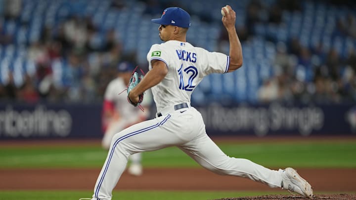 Sep 13, 2023; Toronto, Ontario, CAN; Toronto Blue Jays relief pitcher Jordan Hicks (12) throws a