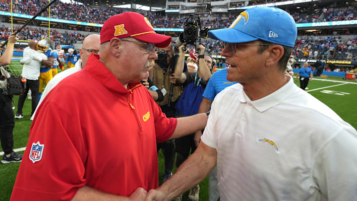 Sep 29, 2024; Inglewood, California, USA; Kansas City Chiefs coach Andy Reid shakes hands with Los Angeles Chargers coach Jim Harbaugh after the game at SoFi Stadium. Mandatory Credit: Kirby Lee-Imagn Images