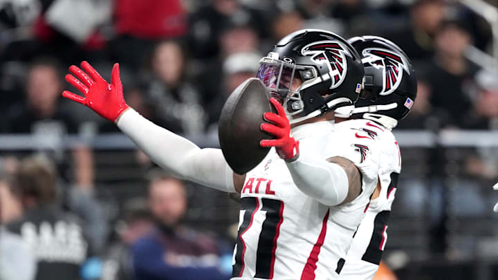 Atlanta Falcons safety Justin Simmons (31) celebrates after intercepting a pass against the Las Vegas Raiders. Atlanta Falcons safety Justin Simmons (31) celebrates after intercepting a pass against the Las Vegas Raiders.