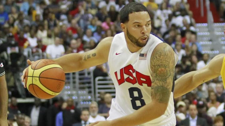 July 16, 2012; Washington, DC, USA; United States guard Deron Williams (8) dribbles the ball against Brazil in the first half at Verizon Center. Team USA won 80-69. Mandatory Credit: Geoff Burke-Imagn Images