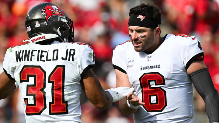 Oct 22, 2023; Tampa, Florida, USA; Tampa Bay Buccaneers defensive back Antoine Winfield Jr. (31) celebrates with quarterback Baker Mayfield (6) after causing a turnover in the second half against the Atlanta Falcons at Raymond James Stadium. Mandatory Credit: Jonathan Dyer-USA TODAY Sports