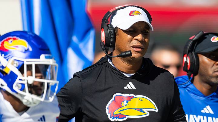 Nov 8, 2025; Tucson, Arizona, USA; Kansas Jayhawks defensive coordinator D.K. McDonald against the Arizona Wildcats at Arizona Stadium. Mandatory Credit: Mark J. Rebilas-Imagn Images Nov 8, 2025; Tucson, Arizona, USA; Kansas Jayhawks defensive coordinator D.K. McDonald against the Arizona Wildcats at Arizona Stadium. Mandatory Credit: Mark J. Rebilas-Imagn Images