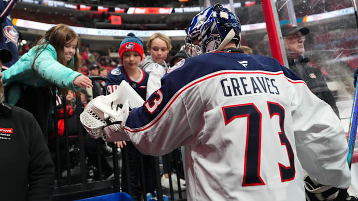 Blue Jackets goalie Jet Greaves gives a fan a puck after warmups Blue Jackets goalie Jet Greaves gives a fan a puck after warmups