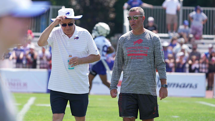 Terry Pegula, owner, CEO and president of the Buffalo Bills and Brandon Beane, general manager, talk and walk off the field at the end of practice at the Buffalo Bills training camp at St. John Fisher University in Pittsford on July 24, 2025.