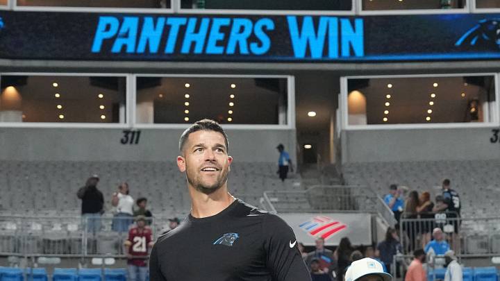 Carolina Panthers head coach Dave Canales on the field after the game Carolina Panthers head coach Dave Canales on the field after the game