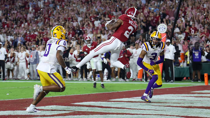 Nov 8, 2025; Tuscaloosa, Alabama, USA; Alabama Crimson Tide wide receiver Ryan Williams (2) makes a reception for a touchdown defended by Louisiana State Tigers safety Tamarcus Cooley (0) and cornerback DJ Pickett (3) during the second quarter of the game at Saban Field at Bryant-Denny Stadium. Mandatory Credit: David Leong-Imagn Images
