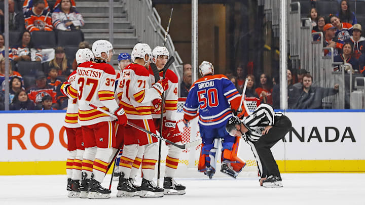 The Calgary Flames celebrate a goal scored by Calgary Flames forward Justin Kirkland (58) during the third period against the Edmonton Oilers
