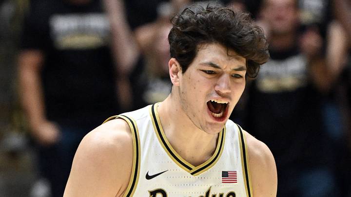 Purdue Boilermakers forward Raleigh Burgess (34) celebrates a three-pointer. Purdue Boilermakers forward Raleigh Burgess (34) celebrates a three-pointer.