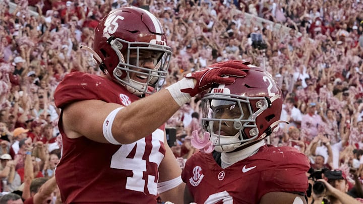 Oct 21, 2023; Tuscaloosa, Alabama, USA; Alabama Crimson Tide tight end Robbie Ouzts (45) celebrates with Alabama Crimson Tide running back Jase McClellan (2) after McClellan scored against Tennessee at Bryant-Denny Stadium. Alabama defeated Tennessee 34-20. Oct 21, 2023; Tuscaloosa, Alabama, USA; Alabama Crimson Tide tight end Robbie Ouzts (45) celebrates with Alabama Crimson Tide running back Jase McClellan (2) after McClellan scored against Tennessee at Bryant-Denny Stadium. Alabama defeated Tennessee 34-20.