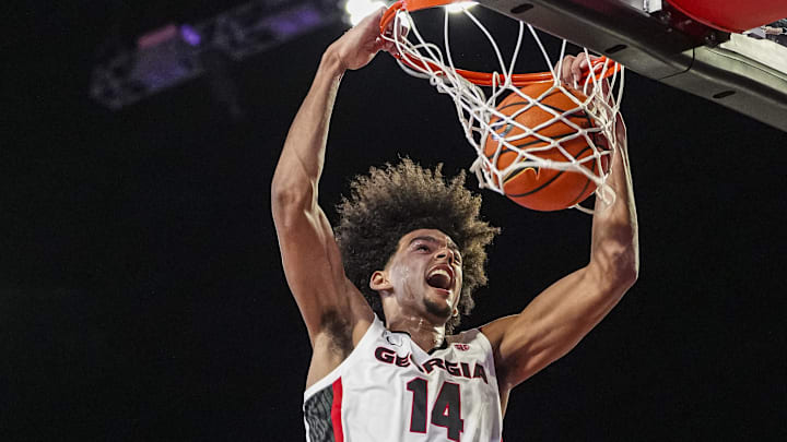 Nov 4, 2024; Athens, Georgia, USA; Georgia Bulldogs forward Asa Newell (14) dunks against the Tennessee Tech Golden Eagles at Stegeman Coliseum. Mandatory Credit: Dale Zanine-Imagn Images