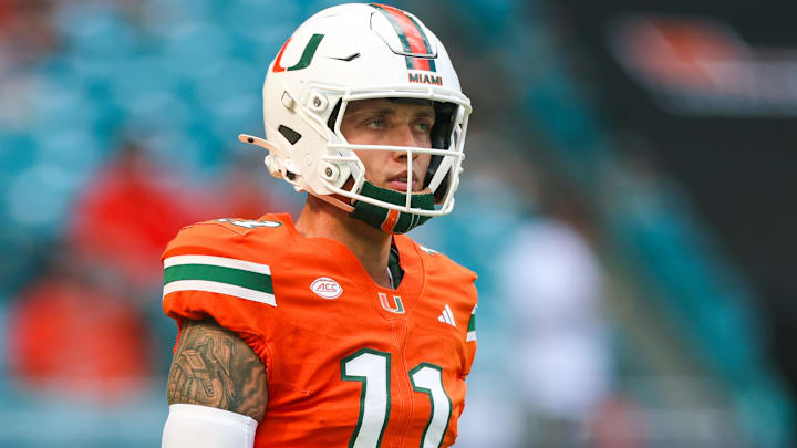 Miami Hurricanes quarterback Carson Beck (11) warms up before a game against the South Florida Bulls at Hard Rock Stadium.
