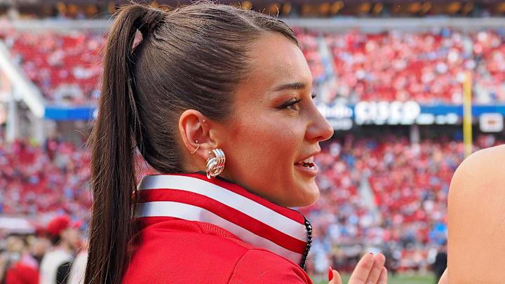 Kristin Juszczyk wears a custom made jacket in show of her support for her husband San Francisco 49ers fullback Kyle Juszczyk.
