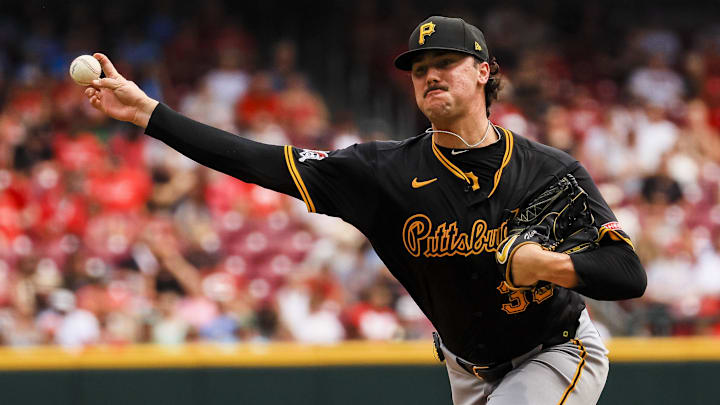 Sep 22, 2024; Cincinnati, Ohio, USA; Pittsburgh Pirates starting pitcher Paul Skenes (30) pitches against the Cincinnati Reds in the third inning at Great American Ball Park. Mandatory Credit: Katie Stratman-Imagn Images