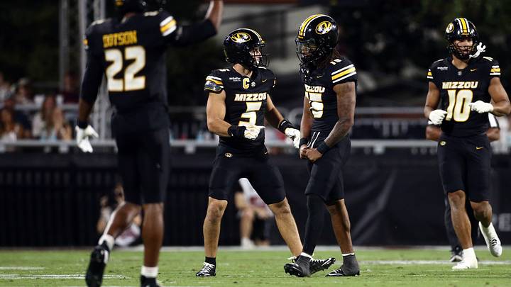 Sep 26, 2026; Starkville, Mississippi, USA; Missouri Tigers linebacker Nicholas Rodriguez (5) and safety Santana Banner (15) react during the third quarter against the Mississippi State Bulldogs at Davis Wade Stadium at Scott Field. Mandatory Credit: Petre Thomas-Imagn Images