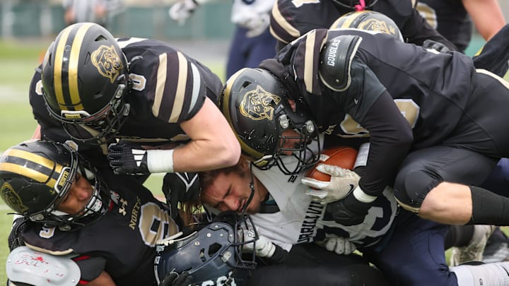 The North Kingstown varsity football team, pictured here competing against Burrillville in the RIIL Division I Super Bowl last season, is one of the top teams in Rhode Island this season.