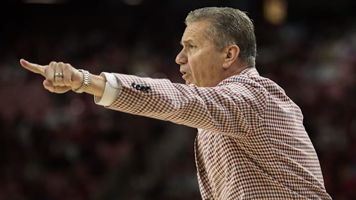 Arkansas Razorbacks head coach John Calipari points to a player on thee court during the first half against the LSU Tigers at Bud Walton Arena.