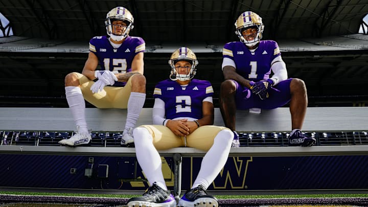 Denzel Boston, Demond Williams Jr. and Jonah Coleman model new UW uniforms. Denzel Boston, Demond Williams Jr. and Jonah Coleman model new UW uniforms.