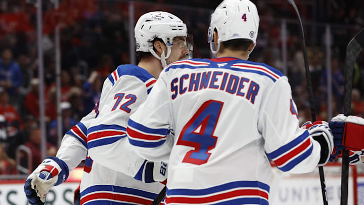 Oct 29, 2024; Washington, District of Columbia, USA; New York Rangers center Filip Chytil (72) celebrates with teammates after scoring a goal against the Washington Capitals in the second period at Capital One Arena. Mandatory Credit: Geoff Burke-Imagn Images