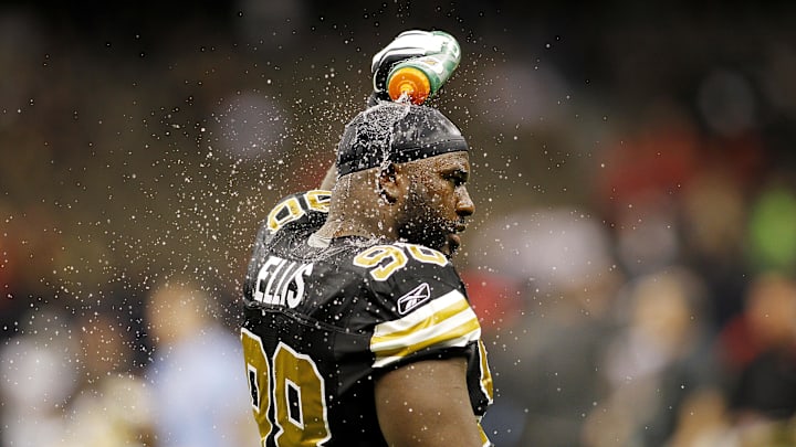 November 06, 2011; New Orleans, LA, USA; New Orleans Saints defensive tackle Sedrick Ellis (98) pours water over his head during warmups prior to kickoff against the Tampa Bay Buccaneers at the Mercedes-Benz Superdome. Mandatory Credit: Crystal LoGiudice-Imagn Images November 06, 2011; New Orleans, LA, USA; New Orleans Saints defensive tackle Sedrick Ellis (98) pours water over his head during warmups prior to kickoff against the Tampa Bay Buccaneers at the Mercedes-Benz Superdome. Mandatory Credit: Crystal LoGiudice-Imagn Images
