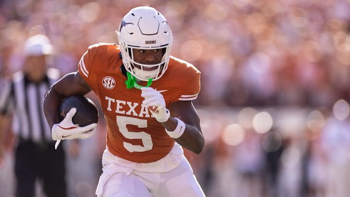 Texas Longhorns wide receiver Ryan Wingo (5) runs the ball against the Kentucky Wildcats