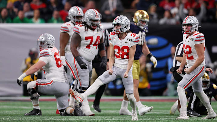 Ohio State Buckeyes place kicker Jayden Fielding (38) reacts after making a field goal against the Notre Dame Fighting Irish during the second half the CFP National Championship college football game at Mercedes-Benz Stadium. Ohio State Buckeyes place kicker Jayden Fielding (38) reacts after making a field goal against the Notre Dame Fighting Irish during the second half the CFP National Championship college football game at Mercedes-Benz Stadium.