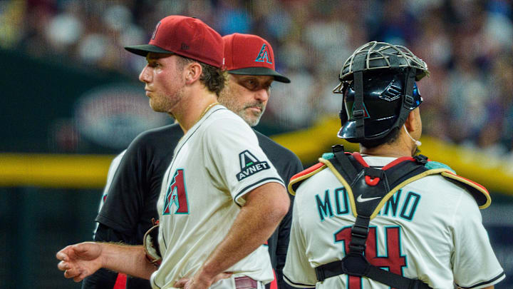 May 31, 2025; Phoenix, Arizona, USA; Arizona Diamondbacks pitcher Brandon Pfaadt (32) and manager Corey Lovell (17) react after Pfaadt is replaced after giving up nine runs in the first inning against the Washington Nationals at Chase Field. Mandatory Credit: Allan Henry-Imagn Images May 31, 2025; Phoenix, Arizona, USA; Arizona Diamondbacks pitcher Brandon Pfaadt (32) and manager Corey Lovell (17) react after Pfaadt is replaced after giving up nine runs in the first inning against the Washington Nationals at Chase Field. Mandatory Credit: Allan Henry-Imagn Images