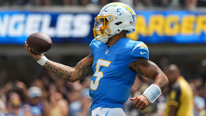 Los Angeles Chargers quarterback Trey Lance runs out of bounds during the second quarter against the New Orleans Saints.