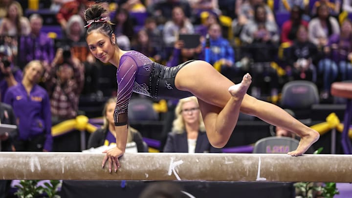 LSU gymnast Kailin Chio competes on the balance beam during a meet against the Missouri Tigers.