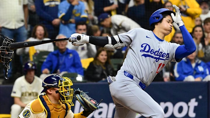 Oct 14, 2025; Milwaukee, Wisconsin, USA; Los Angeles Dodgers designated hitter Shohei Ohtani (17) strikes out against the Milwaukee Brewers in the eighth inning during game two of the NLCS round for the 2025 MLB playoffs at American Family Field. Mandatory Credit: Benny Sieu-Imagn Images