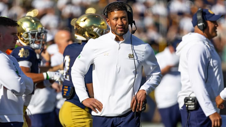 Oct 11, 2025; South Bend, Indiana, USA; Notre Dame Fighting Irish head coach Marcus Freeman looks to the scoreboard against the NC State Wolfpack during the first half at Notre Dame Stadium. Mandatory Credit: Michael Caterina-Imagn Images