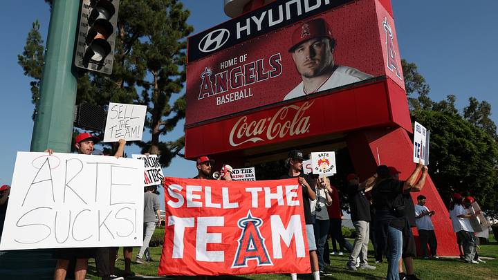 May 23, 2026; Anaheim, California, USA; Los Angeles Angels fans gather outside Angel Stadium before the game between the Los Angeles Angels and the Texas Rangers to protest the Angels team owner Arte Moreno. Mandatory Credit: Kiyoshi Mio-Imagn Images May 23, 2026; Anaheim, California, USA; Los Angeles Angels fans gather outside Angel Stadium before the game between the Los Angeles Angels and the Texas Rangers to protest the Angels team owner Arte Moreno. Mandatory Credit: Kiyoshi Mio-Imagn Images
