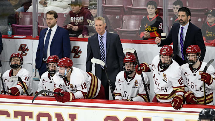 Feb 28, 2025; Chestnut Hill, MA, USA; Boston College Eagles head coach Greg Brown (center) looks on during the third period against the University of New Hampshire Wildcats at Conte Forum. Mandatory Credit: Eric Canha-Imagn Images Feb 28, 2025; Chestnut Hill, MA, USA; Boston College Eagles head coach Greg Brown (center) looks on during the third period against the University of New Hampshire Wildcats at Conte Forum. Mandatory Credit: Eric Canha-Imagn Images