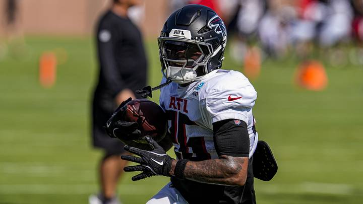 Atlanta Falcons running back Carlos Washington Jr. runs after a catch during practice at training camp at IBM Performance Field last summer. Atlanta Falcons running back Carlos Washington Jr. runs after a catch during practice at training camp at IBM Performance Field last summer.