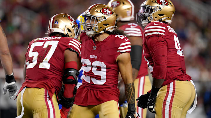 Dec 12, 2024; Santa Clara, California, USA; San Francisco 49ers linebacker Dre Greenlaw (57) is congratulated by safety Talanoa Hufanga (29) after making a tackle against the Los Angeles Rams in the first quarter at Levi's Stadium. 