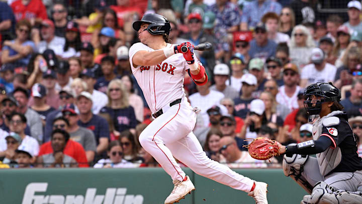 Sep 1, 2025; Boston, Massachusetts, USA; Boston Red Sox left fielder Nate Eaton (40) hits a single against the Cleveland Guardians during the third inning at Fenway Park. Mandatory Credit: Eric Canha-Imagn Images