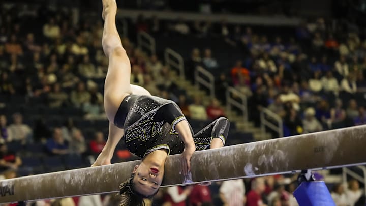 Mar 18, 2023; Duluth, GA, USA; Missouri Tigers gymnast Helen Hu competes on the balance beam during the SEC Gymnastics Championship at Gas South Arena. Mandatory Credit: Dale Zanine-Imagn Images Mar 18, 2023; Duluth, GA, USA; Missouri Tigers gymnast Helen Hu competes on the balance beam during the SEC Gymnastics Championship at Gas South Arena. Mandatory Credit: Dale Zanine-Imagn Images