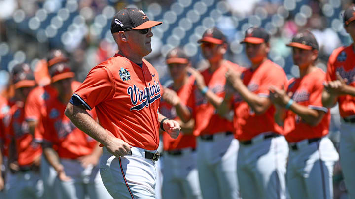 Virginia Cavalier head coach Brian O'Connor takes the field before the game against the North Carolina Tar Heels at Charles Schwab Filed Omaha.