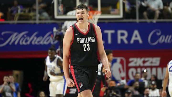 Jul 15, 2024; Las Vegas, NV, USA; Portland Trail Blazers center Donovan Clingan (23) reacts to a play against the Philadelphia 76ers during the second half at Thomas & Mack Center. Mandatory Credit: Lucas Peltier-Imagn Images