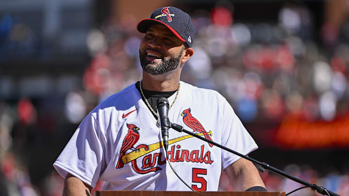 Oct 2, 2022; St. Louis, Missouri, USA; St. Louis Cardinals first baseman Albert Pujols (5) addresses the crowd during a farewell ceremony for Pujols and catcher Yadier Molina (4) before a game against the Pittsburgh Pirates at Busch Stadium. Mandatory Credit: Jeff Curry-Imagn Images Oct 2, 2022; St. Louis, Missouri, USA; St. Louis Cardinals first baseman Albert Pujols (5) addresses the crowd during a farewell ceremony for Pujols and catcher Yadier Molina (4) before a game against the Pittsburgh Pirates at Busch Stadium. Mandatory Credit: Jeff Curry-Imagn Images