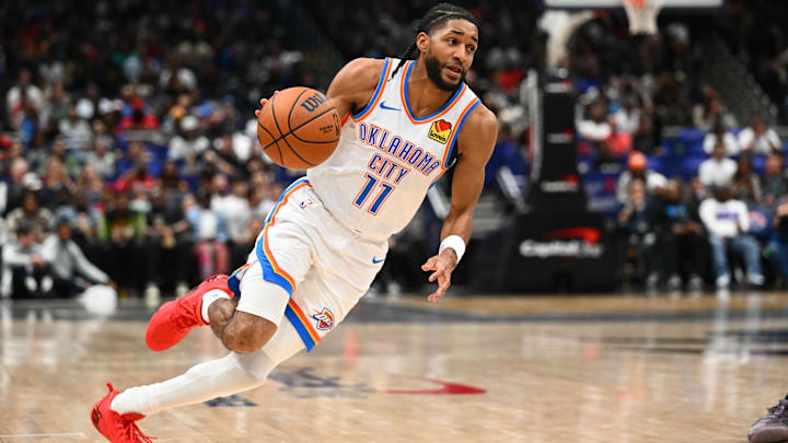 Mar 21, 2026; Washington, District of Columbia, USA; Oklahoma City Thunder guard Isaiah Joe (11) advances the ball against the Washington Wizards during the second half at Capital One Arena. Mandatory Credit: Brad Mills-Imagn Images