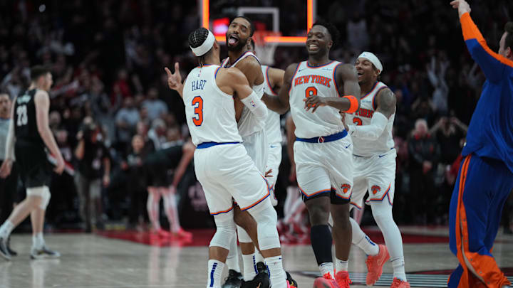 Mar 12, 2025; Portland, Oregon, USA; New York Knicks small forward Mikal Bridges (25) celebrates with teammates after making the game-winning shot in overtime against the Portland Trail Blazers at Moda Center. Mandatory Credit: Soobum Im-Imagn Images Mar 12, 2025; Portland, Oregon, USA; New York Knicks small forward Mikal Bridges (25) celebrates with teammates after making the game-winning shot in overtime against the Portland Trail Blazers at Moda Center. Mandatory Credit: Soobum Im-Imagn Images