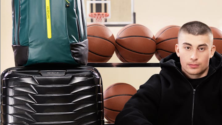Payton Pritchard sits among his Samsonite luggage. Payton Pritchard sits among his Samsonite luggage.