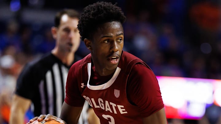 Dec 21, 2025; Gainesville, Florida, USA; Colgate Raiders guard Jalen Cox (3) dribbles the ball against the Florida Gators during the first half at Exactech Arena at the Stephen C. O'Connell Center. Mandatory Credit: Matt Pendleton-Imagn Images