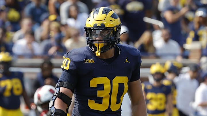 Sep 14, 2024; Ann Arbor, Michigan, USA;  Michigan Wolverines linebacker Jimmy Rolder (30) pursues a play on defense against the Arkansas State Red Wolves at Michigan Stadium. Mandatory Credit: Rick Osentoski-Imagn Images