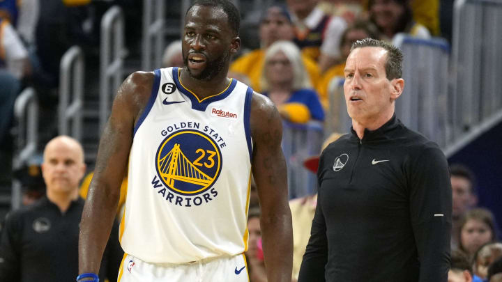 Apr 23, 2023; San Francisco, California, USA; Golden State Warriors forward Draymond Green (23) and assistant coach Kenny Atkinson (right) talk during the third quarter of game four of the 2023 NBA playoffs against the Sacramento Kings at Chase Center. Mandatory Credit: Darren Yamashita-USA TODAY Sports