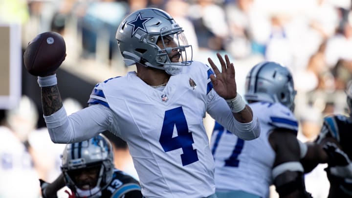 Nov 19, 2023; Charlotte, North Carolina, USA;  Dallas Cowboys quarterback Dak Prescott (4) looks to