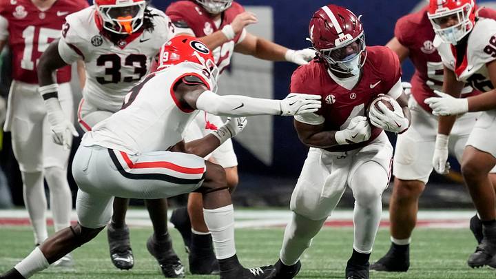 Dec 6, 2025; Atlanta, GA, USA; Georgia linebacker Chris Cole (9) makes a tackle on Alabama running back Daniel Hill (4) at Mercedes-Benz Stadium. Mandatory Credit: Gary Cosby Jr.-Tuscaloosa News Dec 6, 2025; Atlanta, GA, USA; Georgia linebacker Chris Cole (9) makes a tackle on Alabama running back Daniel Hill (4) at Mercedes-Benz Stadium. Mandatory Credit: Gary Cosby Jr.-Tuscaloosa News
