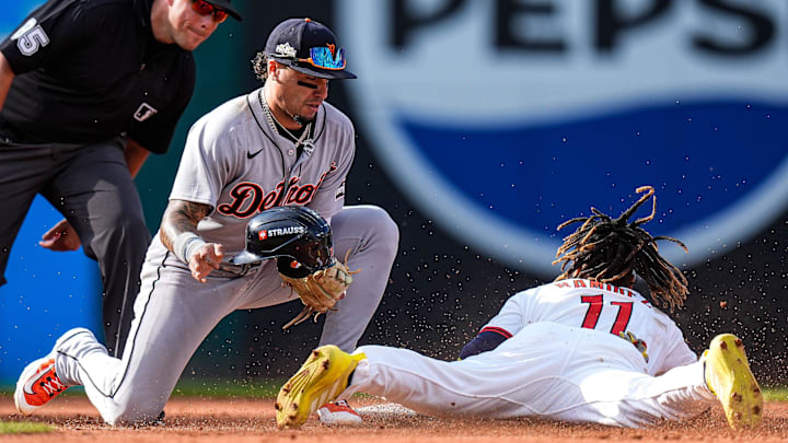 Detroit Tigers shortstop Javier Báez (28) tags out Cleveland Guardians third base José Ramírez (11) at second base during the fourth inning of Game 3 of AL wild-card series at Progressive Field in Cleveland on Thursday, Oct. 2, 2025.
